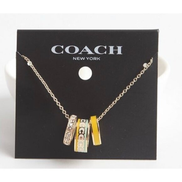 NEW! Coach Gold-Tone Multi-Ring Pendant Necklace With Logo & Crystal Accents - Picture 1 of 7